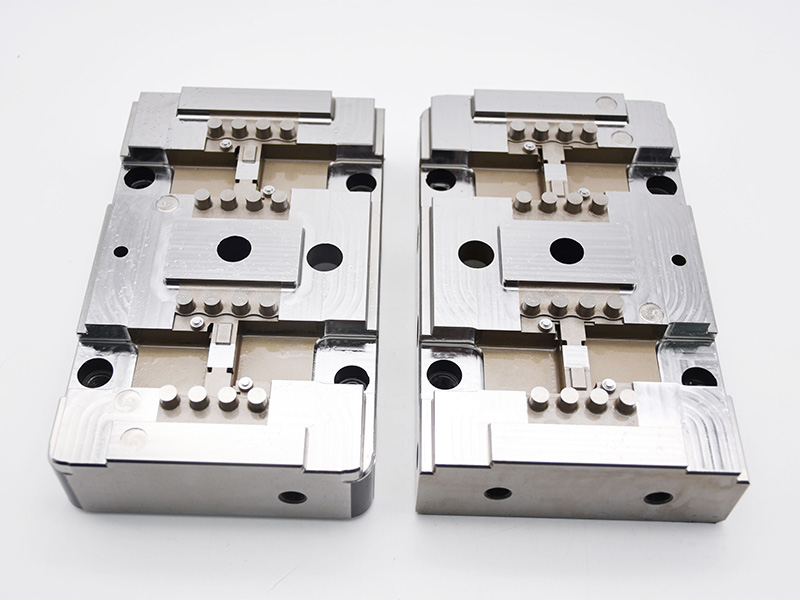 How is a precision mold cavity manufactured?